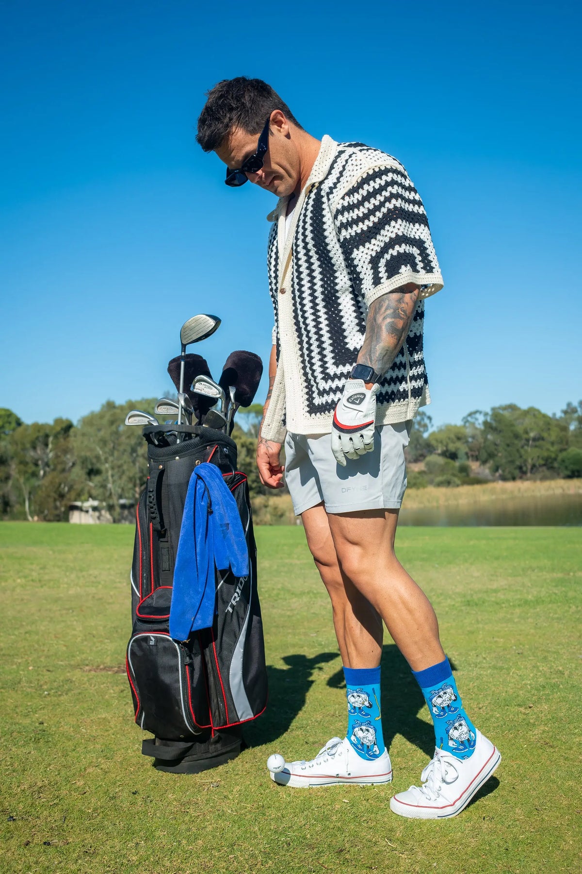 Adult wearing funny 2 Putt golf socks