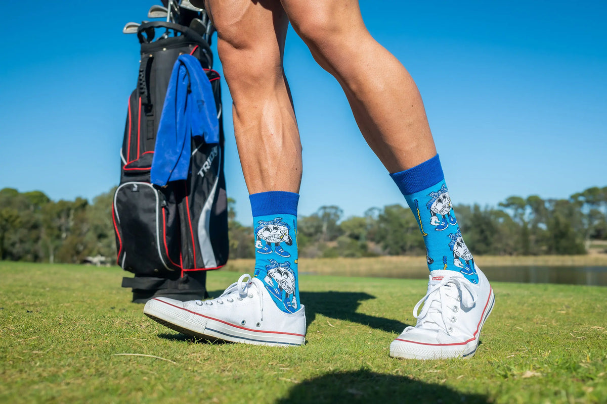 Adult wearing colourful golf socks by Offbeat Socks