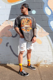 Moonshine Mayhem cowboy zombie socks being worn