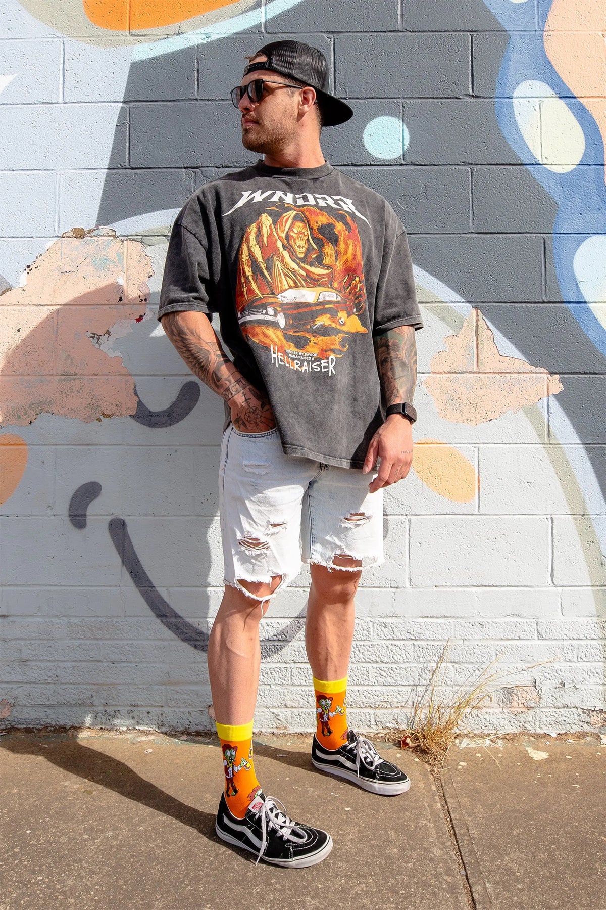 Moonshine Mayhem cowboy zombie socks being worn