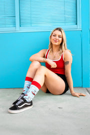 Big Rocking Horse socks worn as part of a colourful casual outfit