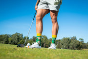 Adult wearing Bogey Smalls golf socks