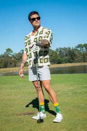 Bogey Smalls novelty golf socks worn by an adult