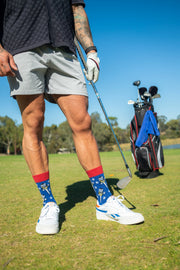 Adult wearing Mr Tee golf socks