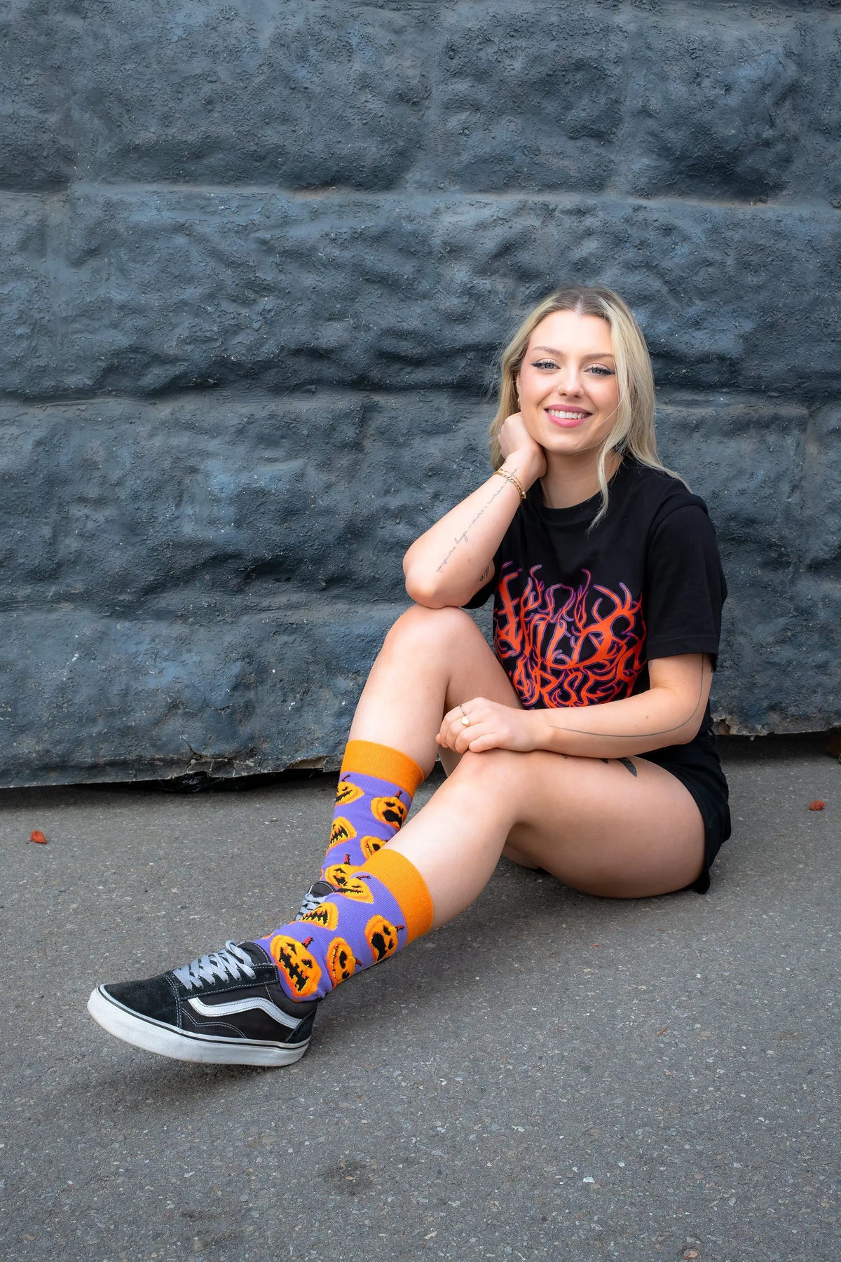 Colourful pumpkin Halloween socks featuring jack-o'-lantern designs