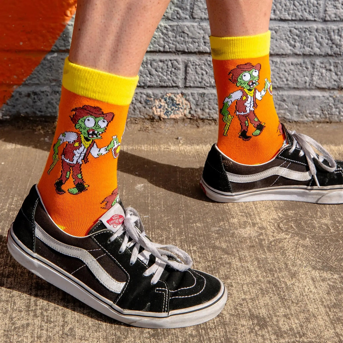 Close-up of Moonshine Mayhem Western zombie sock design
